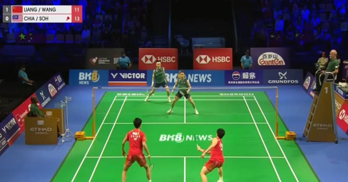 BK8 News branding court-side as Malaysia's Aaron Chia and Soh Wooi Yik face China's Liang Wei Keng and Wang Chang at the Denmark Open
